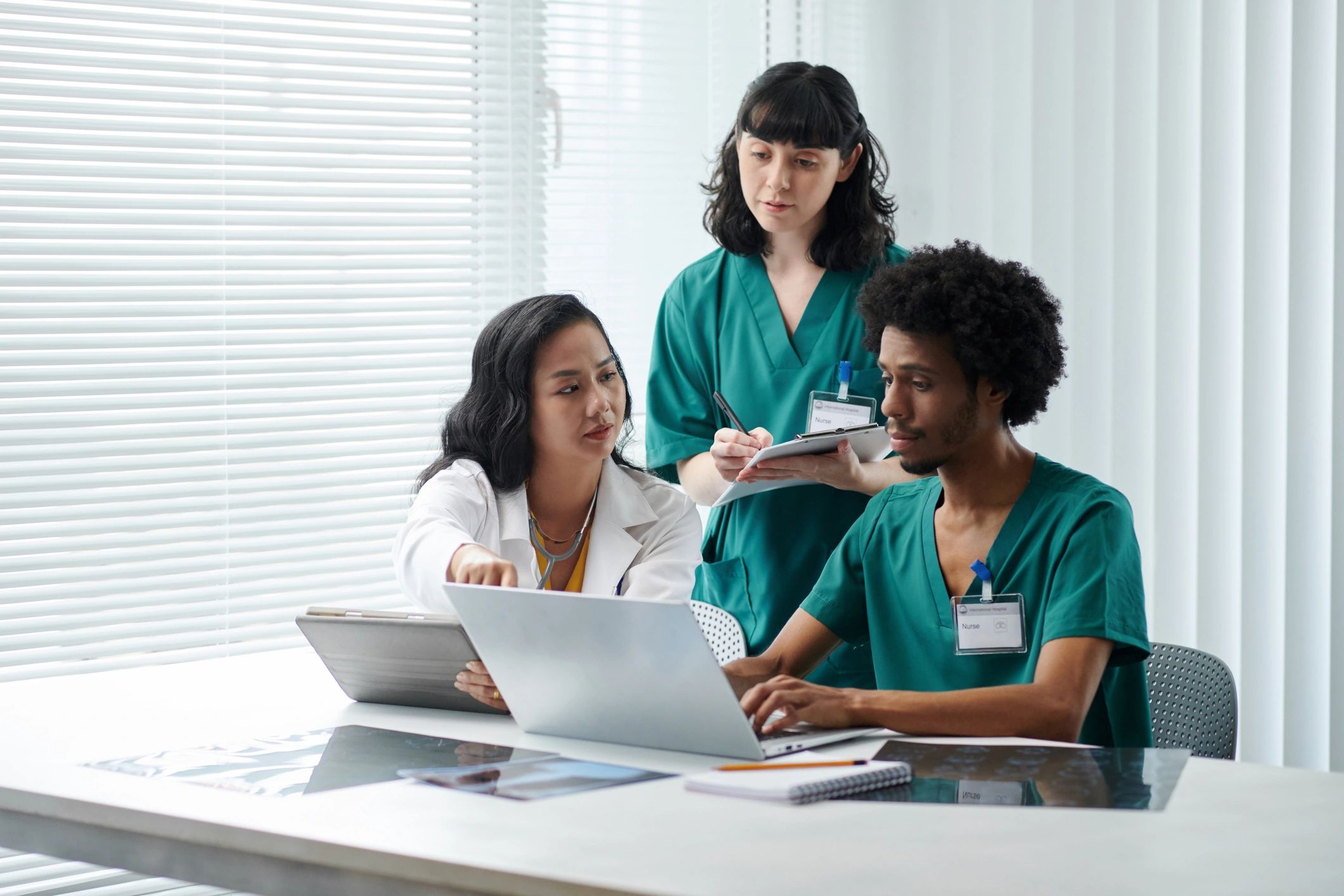 Team members reviewing documents together