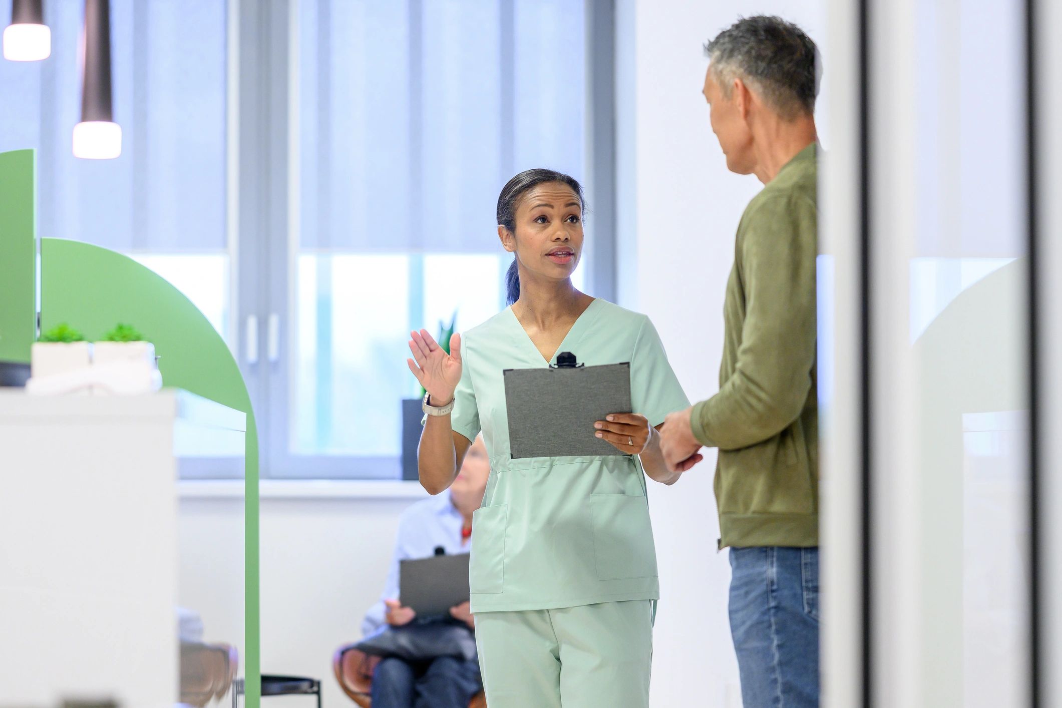One-on-one coaching conversation in a clinical setting
